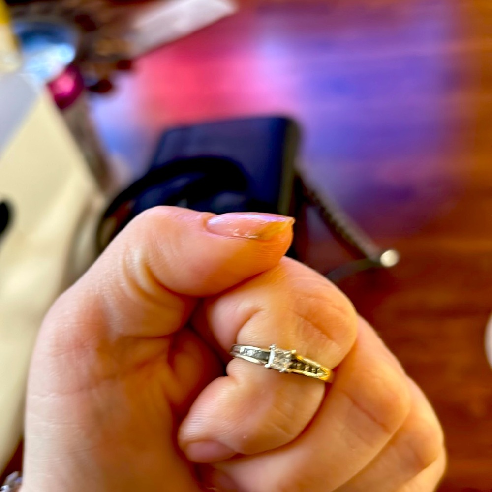 princess cut engagement ring w/ diamonds in the band, from Kay Jewelers.